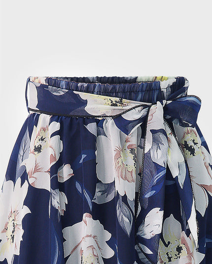 Falda mediana con volantes y lazo floral 