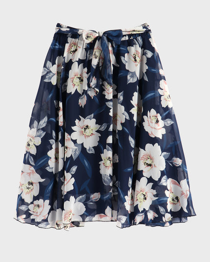 Falda mediana con volantes y lazo floral 
