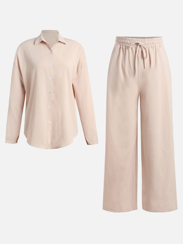 Conjunto de top drapeado rosa y pantalón ancho