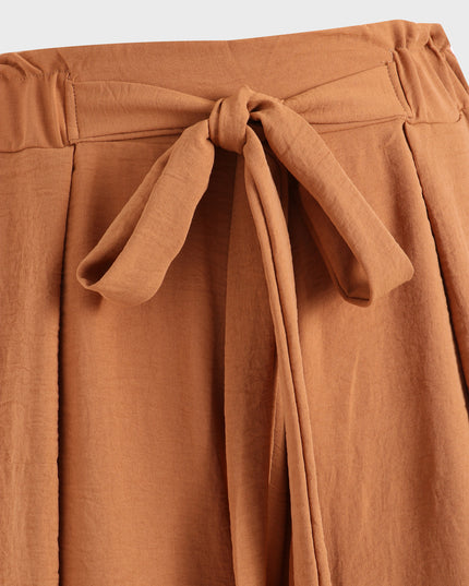 Pantalones Nattily plisados ​​de pierna ancha de tamaño mediano con abertura frontal 