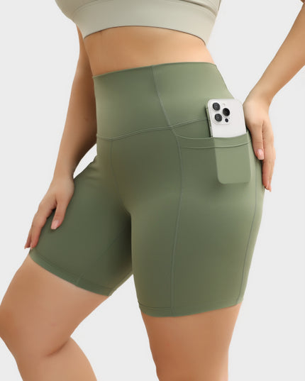 Pantalones cortos de yoga ajustados con levantamiento de cadera y cintura alta de tamaño mediano con bolsillos 